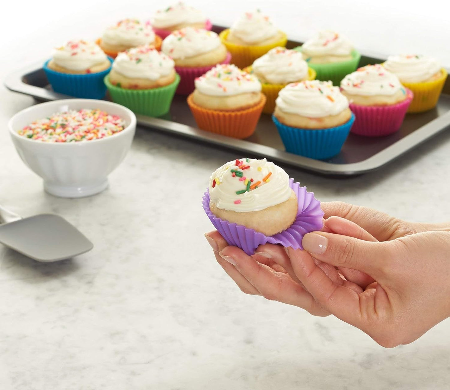 Amazon Basics Reusable Silicone Baking Cups, BPA Free Muffin Liners, Dishwasher Safe, 2.9 x 2.9 x 1.3 in (LxWxH), Multicolor, Pack of 12