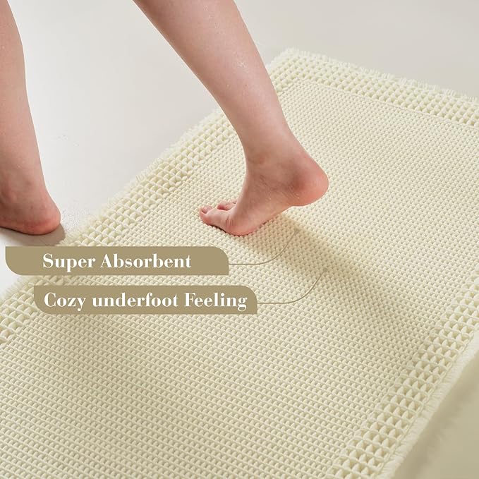 RESARE Waffle Bath Mat for Bathroom, Super Absorbent Bathroom Rugs Non Slip Machine Washable, Ultra Soft Quick Dry Boho Bath Rugs with Tassels for Floor, Upgraded Bordered Design, 18"x30" Cream