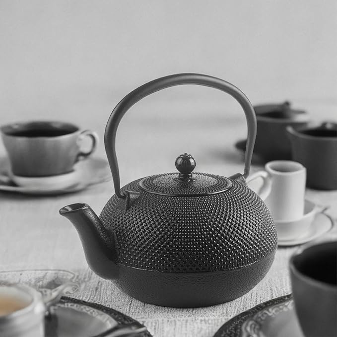 IBILI 40 Oz Cast Iron Teapot with Infuser | Made in Spain | Hammered Texture, Enameled Interior, Stovetop & Induction Compatible, Japanese Kettle for Loose Leaf Tea, Tetsubin Design, Black